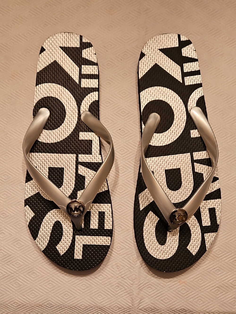 Michael Kors Black & White Logo Flip Flop Sandals with Silver Straps